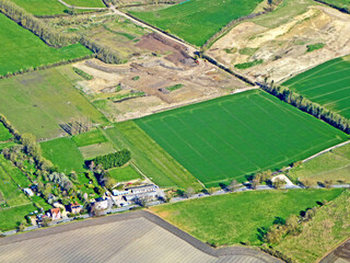 Aerial view of Wiltshire house and countryside