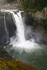 Snoqualmie Falls in vertical plunge over the precipice in winter