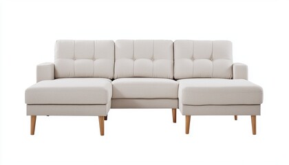 Fototapeta premium A modern, light-colored sectional sofa with tufted cushions and wooden legs, perfect for contemporary living spaces.