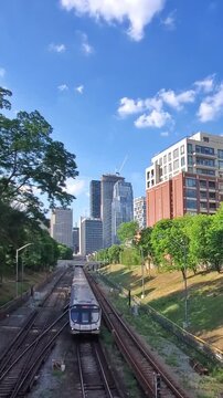 Toronto Transit Commission New upgraded train departing from Davisville subway station platform.