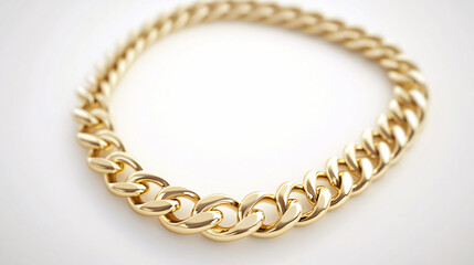 Obraz premium A close-up of a thick gold Cuban link chain necklace placed on a white background showcasing its polished and luxurious design 