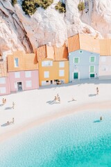 Dreamy Coastal Village in Pastel Tones Aerial View of Tranquil Beach Scene