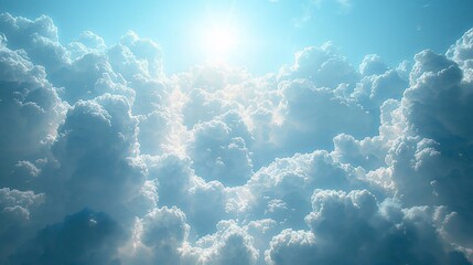 Bright sun shining through fluffy cumulus clouds.