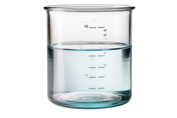 Glass container filled with clear liquid marked with measurement lines on a white background