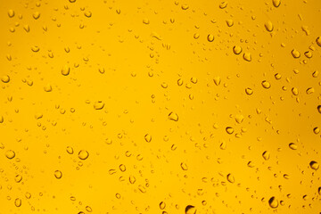 rain in a desert, water droplets on a window glass