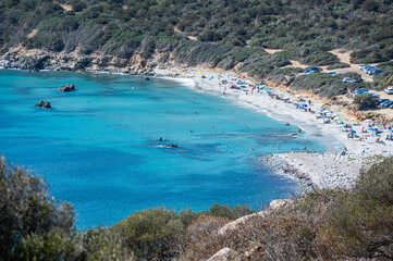 vIllasimius, Italy - 09-05-2024: Aerial view of the beautiful beach of Cala Carbonara in Villasimius in Sardinia
