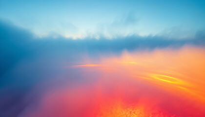Fototapeta premium Dreamy sunset cloudscape with fiery orange and soft blue hues, perfect for headers, wallpapers, and inspiring environmental or travel campaigns