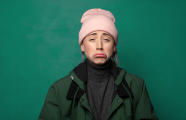 feeling sad and whiney with an unhappy look, crying with a negative and frustrated attitude