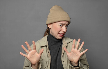 feeling disgusted and irritated, sticking tongue out, disliking something nasty and yucky