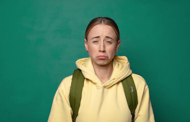 feeling sad and whiney with an unhappy look, crying with a negative and frustrated attitude