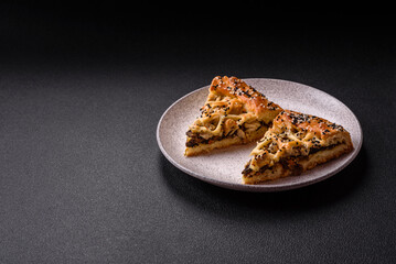 French quiche with chicken or salmon, cheese, salt, spices and herbs