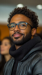 Fototapeta premium Portrait of a young man with glasses and a turtleneck sweater