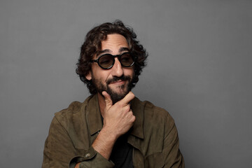 young bearded man wearing sun glasses