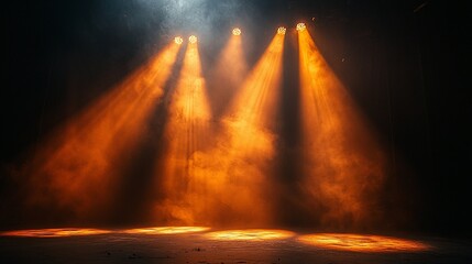 Naklejka premium Three orange stage spotlights with smoke.