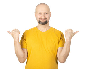 Fototapeta premium Cheerful Man in Yellow T-Shirt Pointing Thumbs Toward Both Sides