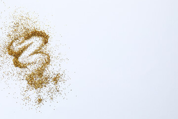 Beautiful golden confetti on a white background