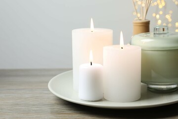 Beautiful composition with candles on the table