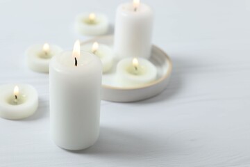 Beautiful composition with candles on the table