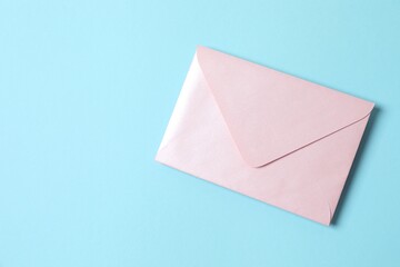 Paper envelope on color background