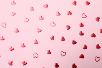Beautiful red hearts on color background
