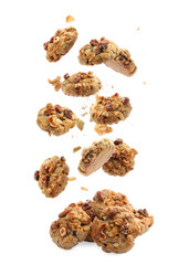 Yummy nut cookies falling on white background