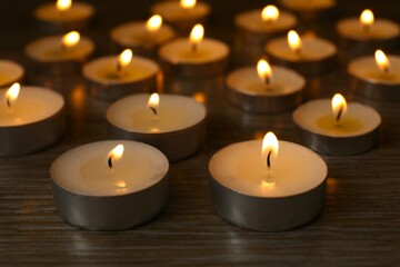 Burning candles in a dark space