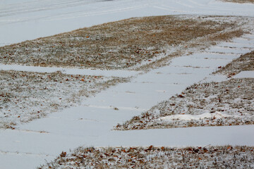 A sidewalk covered in snow