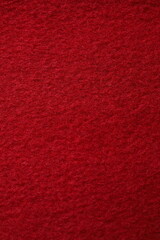 Red fabric background, close up view