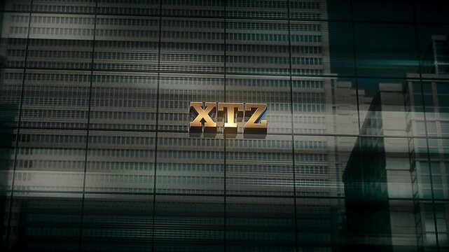 Business Finance Economic Skyscraper Glass Reflections and Golden Text Reads XTZ