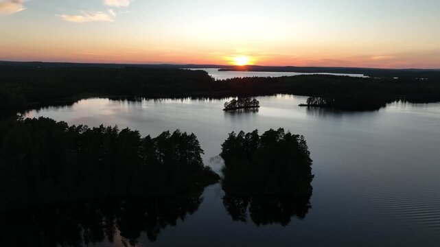 Aerial footage of the Sodra Helgo nature reserve at sunset in Vaxjo Municipality, Kronoberg, Sweden