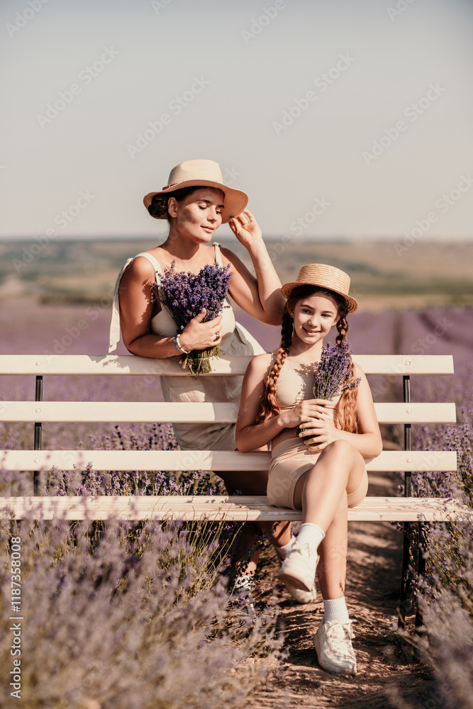 Wall mural woman child sitting bench in field lavender. The woman is holding a bouquet of flowers, and the child is holding a bouquet as well. The scene is peaceful and serene.