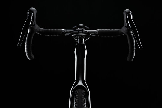 Gravel bike handlebars on black background. Front view.