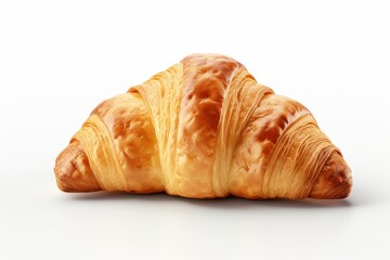Freshly baked croissant with golden layers displayed on a plain background