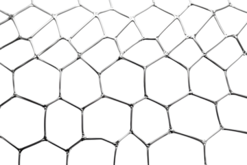 Close-up view of metallic hexagonal mesh pattern on a smooth surface showing intricate designs and textures