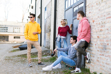 Group of young adults spending time outdoors