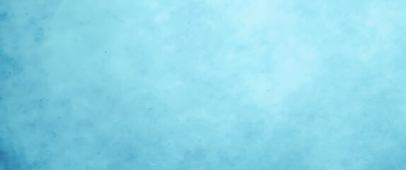 Obraz premium Light blue textured background with soft cloudy effect