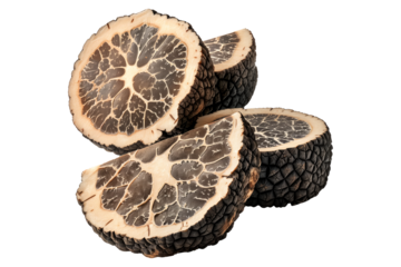 Fresh black Perigord truffles isolated on white transparent background, great for culinary and gourmet themes.