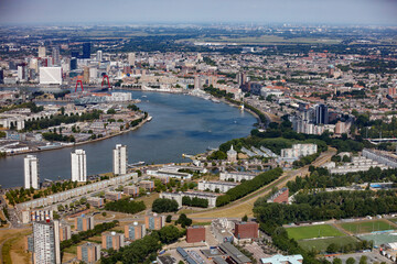 Panoramic view of Rotterdam showcasing the skyline, river, and city layout during a clear day