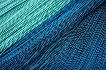 A gradient moving from royal blue to cyan with a heavy grain overlay, giving a textured, artistic feel.