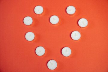 heart made of white candles on a red background. Happy St Valentine's Day, I love you