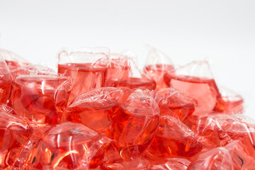 washing laundry capsules on white background