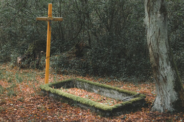 Łęsko - an old, post-German, abandoned cemetery hidden in the autumn forest.