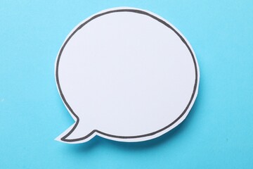 Blank speech bubble on light blue background. Space for text