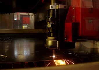 Laser cutting of metal sheet with sparks