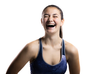 Joyful young woman in sports outfit laughing, close-up portrait