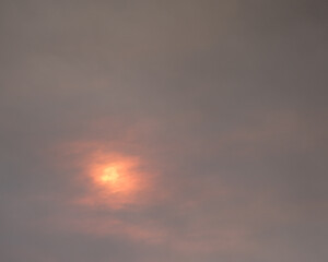 sun in a smokey sky