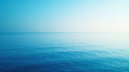 Obraz premium Serene Ocean Horizon A Tranquil Blue Seascape with Gentle Waves