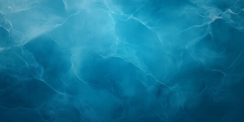 Calm blue water surface with gentle ripples and soft light reflections.