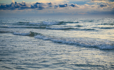Sea with waves splashing. Ocean wave seascape. Sandy summer beach. Sea view for nature background.