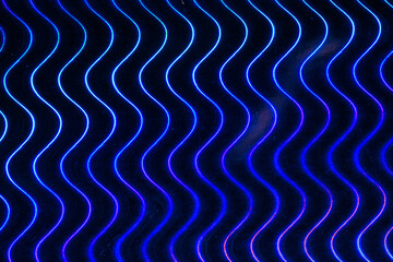 The image is a close up of a blue wave pattern